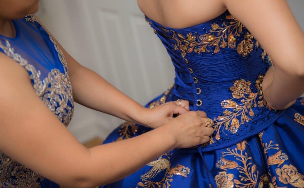 Model wearing a blue gown