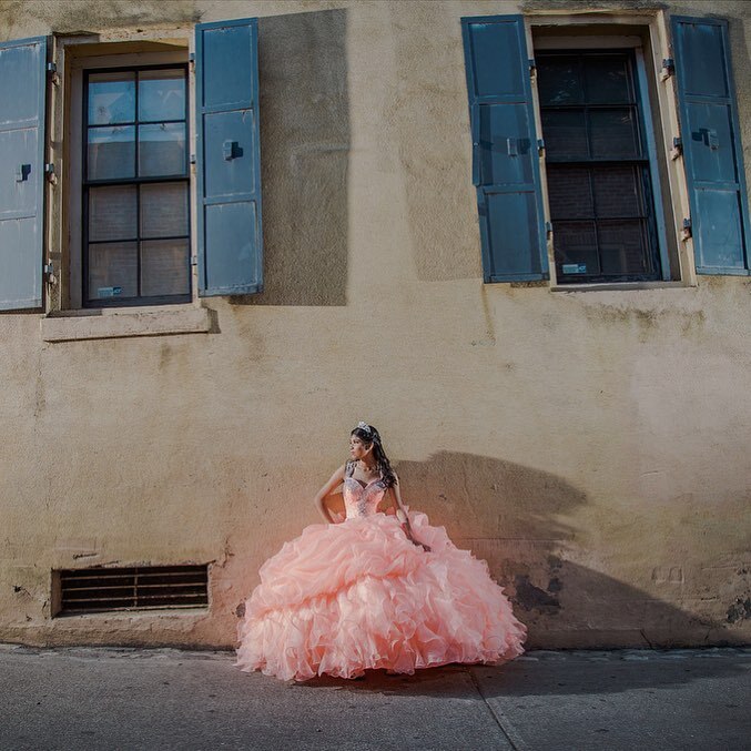 Model wearing a light pink dress