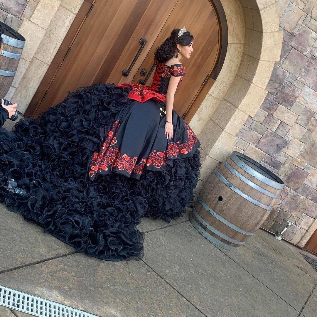 Model wearing a black dress